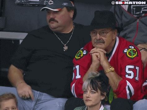 Dick Butkus And His Brother Take In A Blackhawks Game