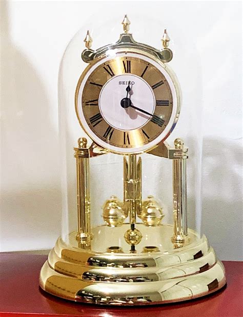 Seiko Anniversary Clock Glass Dome Rotating Pendulum Gold Finish 9