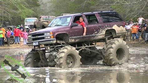 Chevy Suburban With Huge Tractor Tires Hits The Mud Youtube