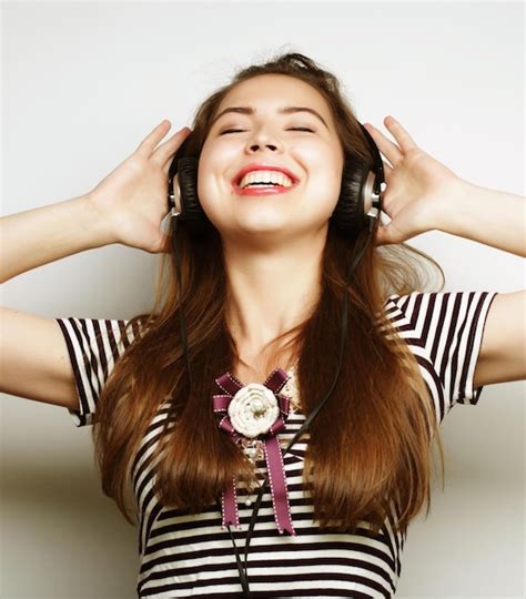 Premium Photo Young Woman Listening To Music Happy And Headphones