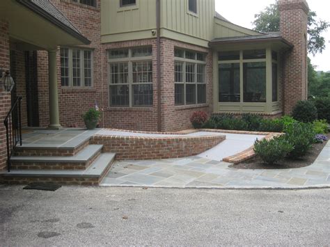 Flagstone And Brick Steps And Heated Handicap Ramp Front House