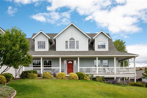 A porch can be a tremendously attractive addition to the exterior of a home. Wrap Around Porch | Quality Hardscapes & Porch Masters