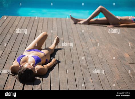 Sunbathing In Bikinis Hi Res Stock Photography And Images Alamy