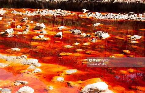 Blood Red Mineral Laden Water In The Rio Tinto River In The Minas De