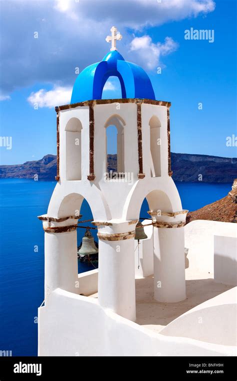 Typical Traditional Blue Domed Church Of Oia Santorini Thira