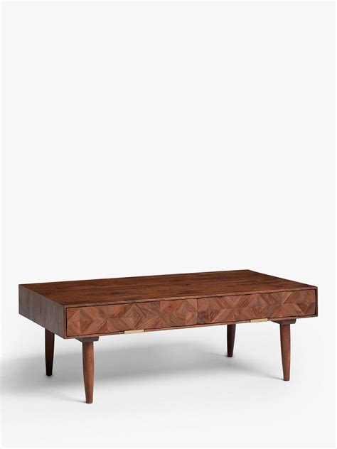Just press a button, placed on the long side, to adjust the height to 7 different positions. Pin on coffee table