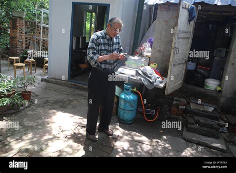 70 year old japanese man koji shimada is pictured in the yard of his japanese style curry