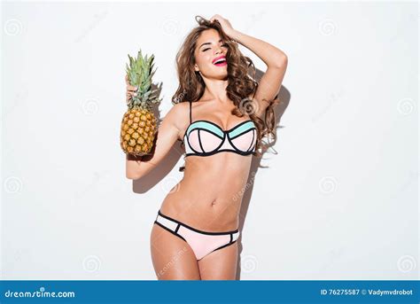 Young Smiling Pretty Girl Holding Pineapple And Posing Stock Image Image Of Attractive Hair