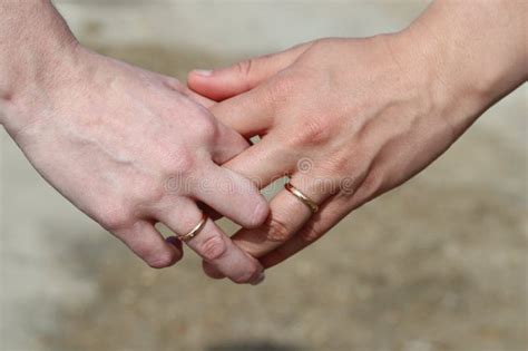 Interlaced Hands With Wedding Rings Stock Image Image Of Engagement