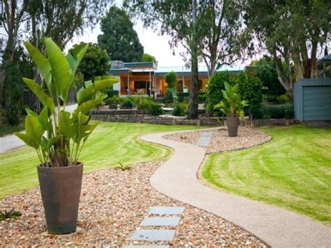 We love to use pots, especially for clients who want color. Low Maintenance Landscaping Ideas Walkway : Rickyhil ...