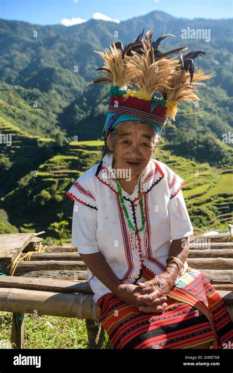 senior ifugao woman in traditional costume banaue rice terraces in the background banaue