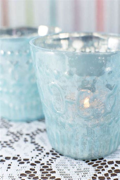 Read reviews for kate aspen® vintage blue glass tealight holders, 4ct. The soft relief pattern adorning our pastel blue votive ...