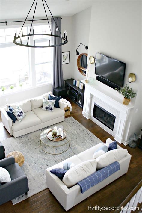 Symmetrical Great Room Layout With Two Sofas Livingroomdecorations
