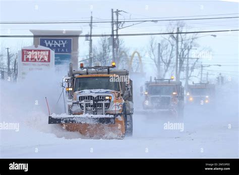 Snow Plows Clear The Roads Following A Winter Storm That Hit The