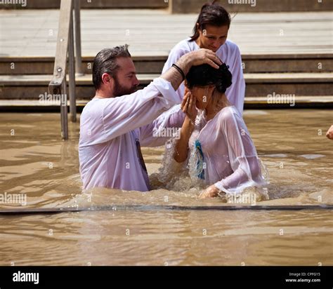 Russian Orthodox Christian Baptism On The Israeli Bank Of The River