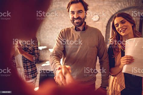 Happy Businessman Shaking Hands With A Candidate At Job Interview Stock