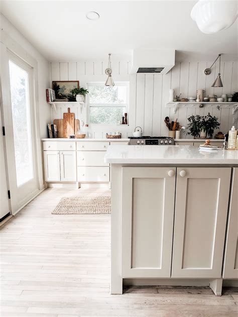 With other regular colors, choosing the right white all boils down to studying the dominant and undertone colors of your kitchen elements. Our Corner Cottage Kitchen Tour | Neutral cabinets ...