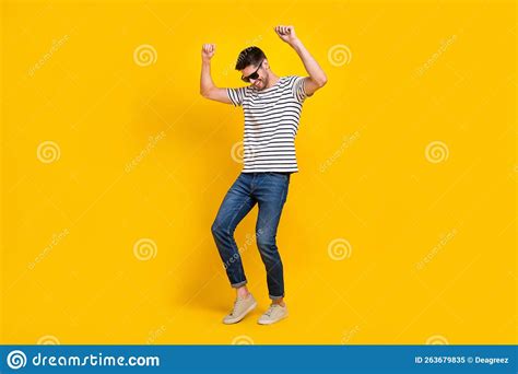 Full Length Photo Of Cheerful Good Mood Man Wear White T Shirt Dark Glasses Rising Fists Having