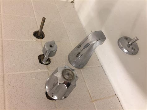 I installed a tub/shower diverter and calked a sink. Tub Faucet - Stuck - No Diverter - Leak - DoItYourself.com ...