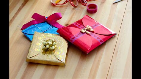 Simple to make for last minute gift and different from the usual gift boxes. DIY How to make cheap, quick and easy gift wrapping in 5 ...
