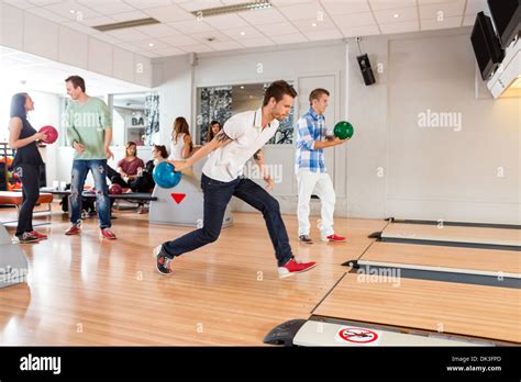 People Playing In Bowling Alley Stock Photo Alamy