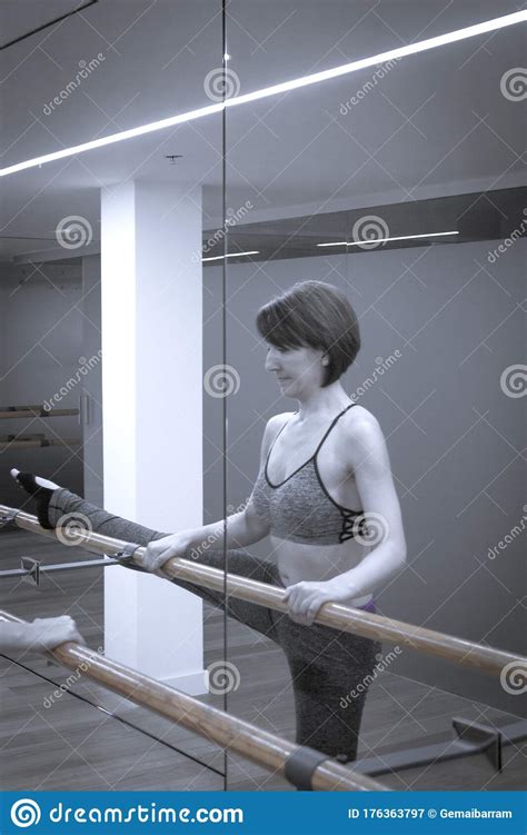 Female Dancer Doing Stretching On The Ballet Barre Stock Image Image