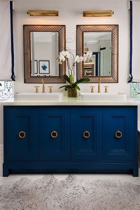 Bathroom's found in modern builds are generally getting smaller and smaller, therefore leaving you with far less storage space. Blue Vanity, Brass Details | Blue bathroom vanity ...