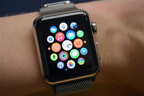 The honeycomb view lays out the circular watch app icons in a hexagonal grid with a focus on the middle of the display, and a miniature clock in the center. Apple Watch App: Is The Smart Watch Revolution Finally ...