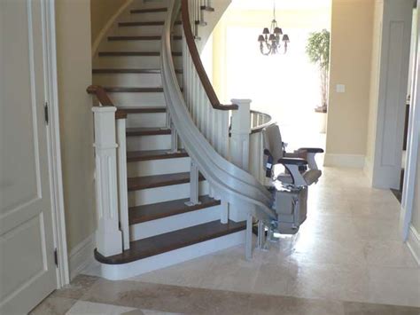 A stair lift is a chair that climbs up and down a staircase on a motorized rail attached. Stair Lifts Affiliates