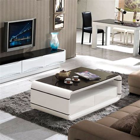This high gloss coffee table is an instant upgrade to your living room interior with its sleek lines. DESIGN HIGH GLOSS WHITE COFFEE TABLE WITH 2 DRAWER AND ...