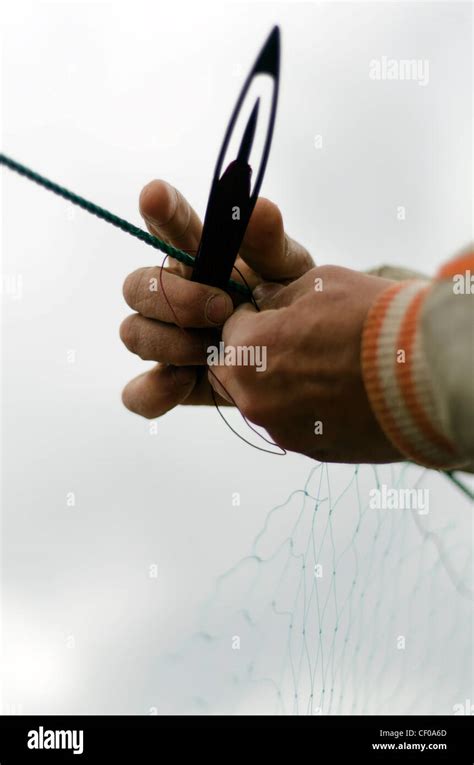 A Fisherman Weaving The Net Fish Before Go Fishing Stock Photo Alamy