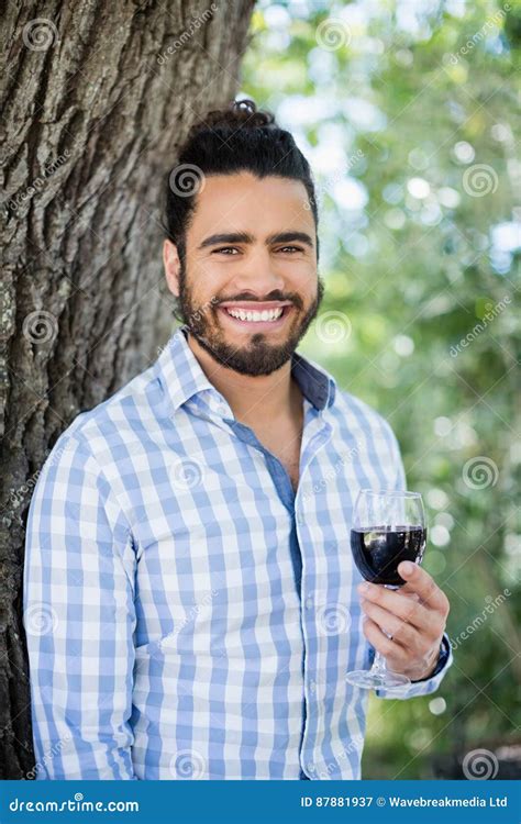 Man Holding Glass Of Wine In The Park Stock Image Image Of Park