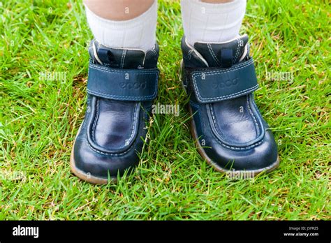 Childs Kid Young Kids Children S Shoes On The Wrong Feet So