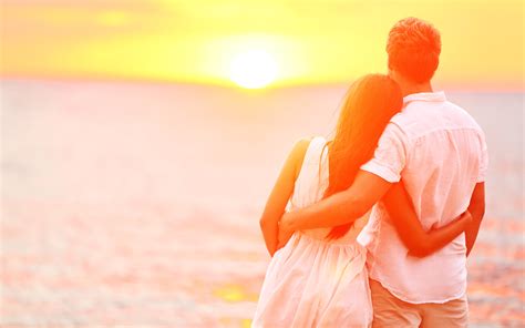Honeymoon Couple Romantic In Love At Beach Sunset