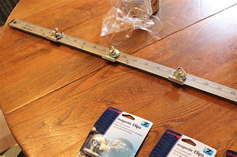 Easy Upcycled And Repurposed Yardstick Photo Displays Organized Clutter