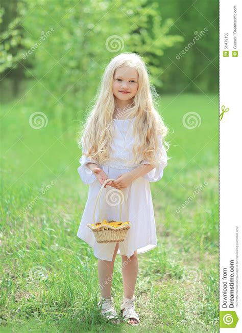 Blond or fair hair, also blonde, is a hair color characterized by low levels of the dark pigment eumelanin. Spring Portrait Of Cute Little Girl In White Dress Stock ...