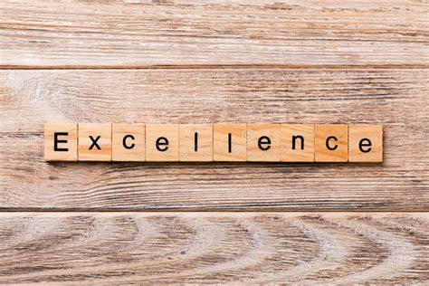 Excellence Word Written On Wood Block Excellence Text On Wooden Table