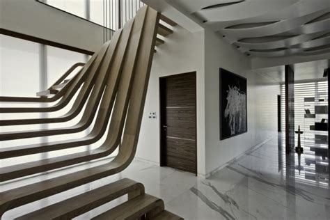 A Sculptural Staircase With Two Flights of Stairs That ...