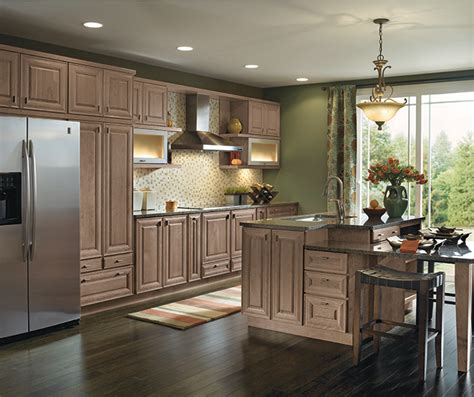 Predominantly red undertones are common on cherry wood. Light Cherry Cabinets in a Galley Kitchen - MasterBrand