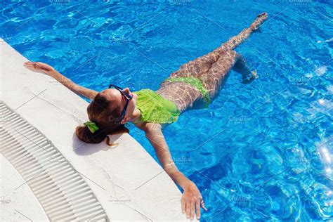 Teen Girl Relaxing Near Swimming Pool High Quality People Images ~ Creative Market