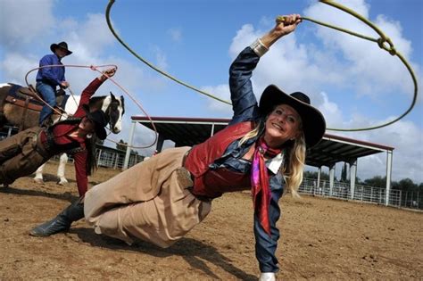 Trick Roper Poses Trick Roping Cowboy And Cowgirl