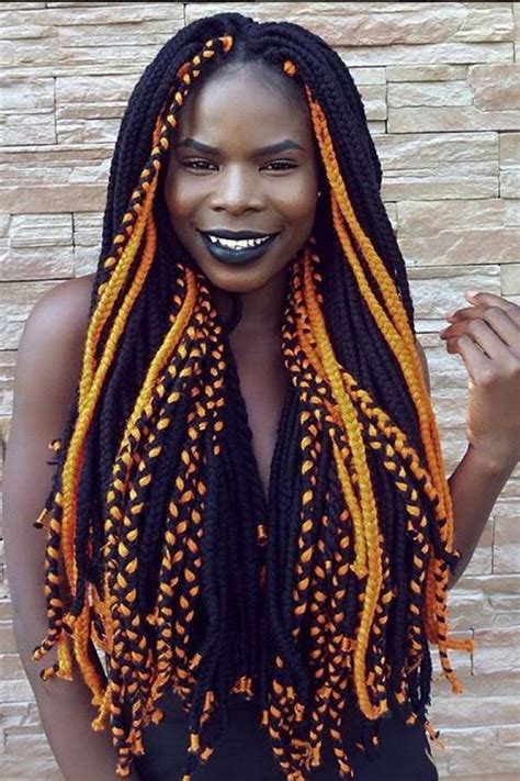 Women hairstyle with colorful hair extensions braided in thin plaits and afrobraids. African braids and twists - how to choose the perfect ...