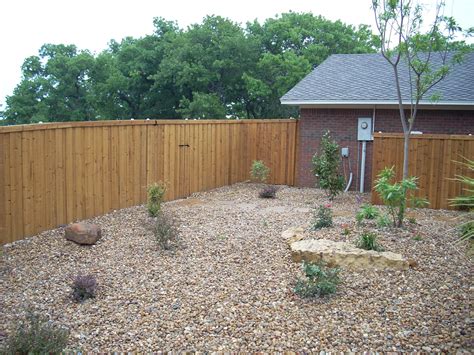 About titan fence & supply company. Raw board on board with trim and cap. Installed by Titan ...