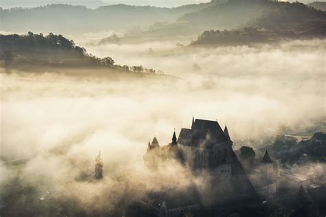 Misty Morning Over Biertan Village Romania Reurope