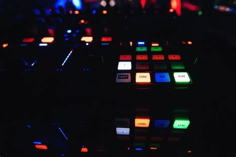 Premium Photo Buttons On Mixer Dj With Lighting For Creating And