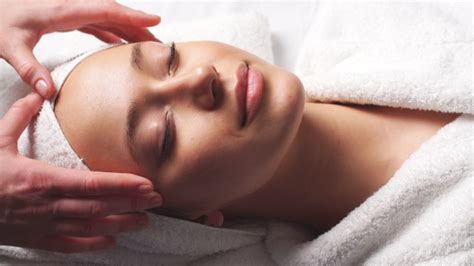 Premium Photo Spa Woman Facial Massage Female Enjoying Relaxing Face Massage In Cosmetology