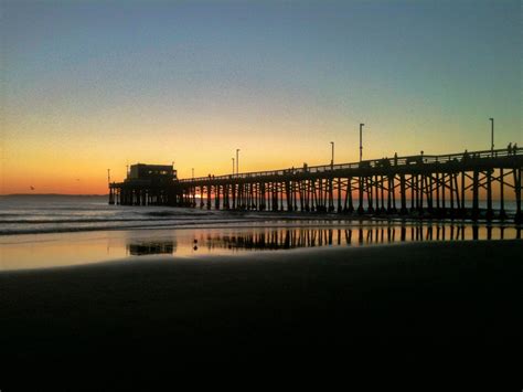 Sunset over the Newport Beach Pier, Newport Beach, CA | Newport beach pier, Beach, Newport beach
