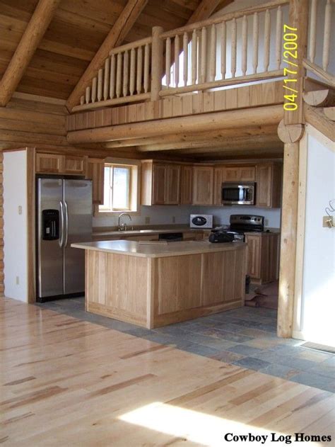 Log Cabin Loft And Kitchen Cowboy Log Homes Log Home Kitchens