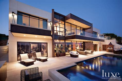 Also known as a butler's call or ring, a servant floor button was situated in the middle of the floor of the formal dining room. Modern Neutral Exterior with Second-Floor Balcony | Modern house design, House exterior, Modern ...