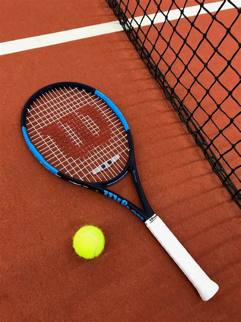 Tennis Racquet On Clay Court 1512x2016 Wallpaper Teahub Io